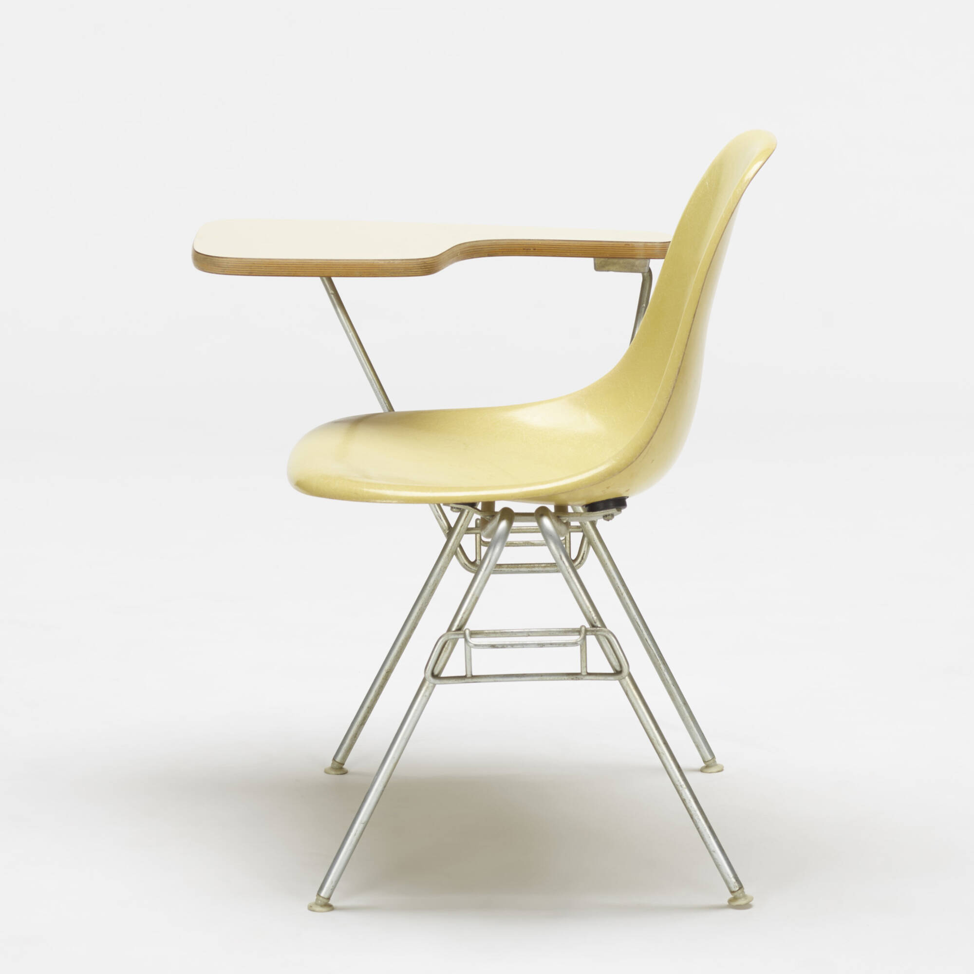 236: CHARLES AND RAY EAMES, I-0715 stacking chair with tablet arm 